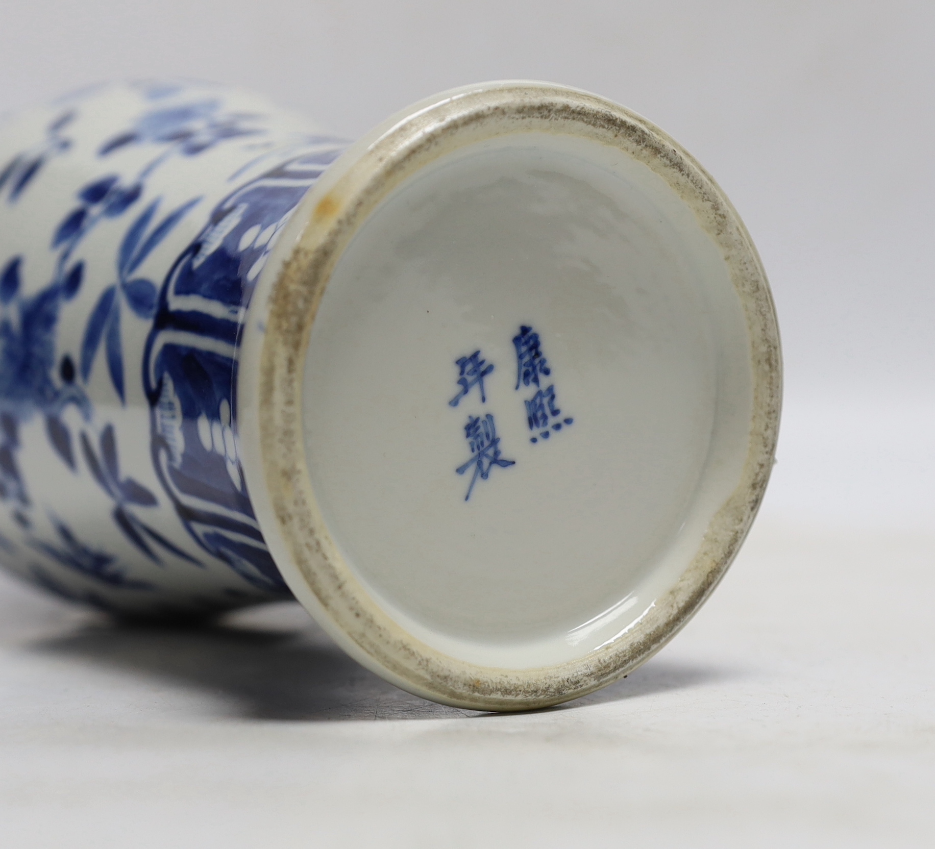 A Chinese blue and white baluster 'blackbirds amid blossom' vase, Kangxi mark, but late 19th century, 27cm